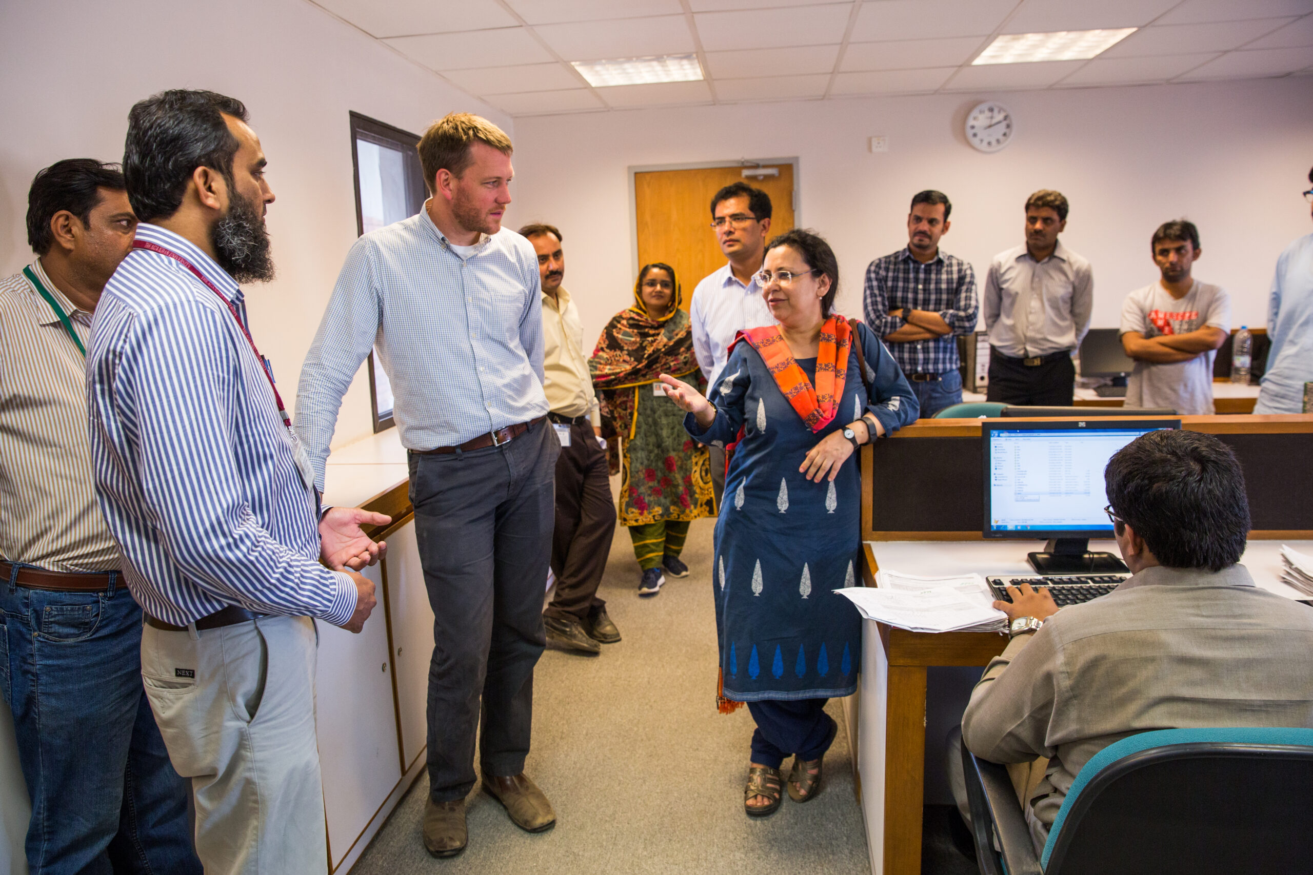 Group of researchers having a discussion in an office room